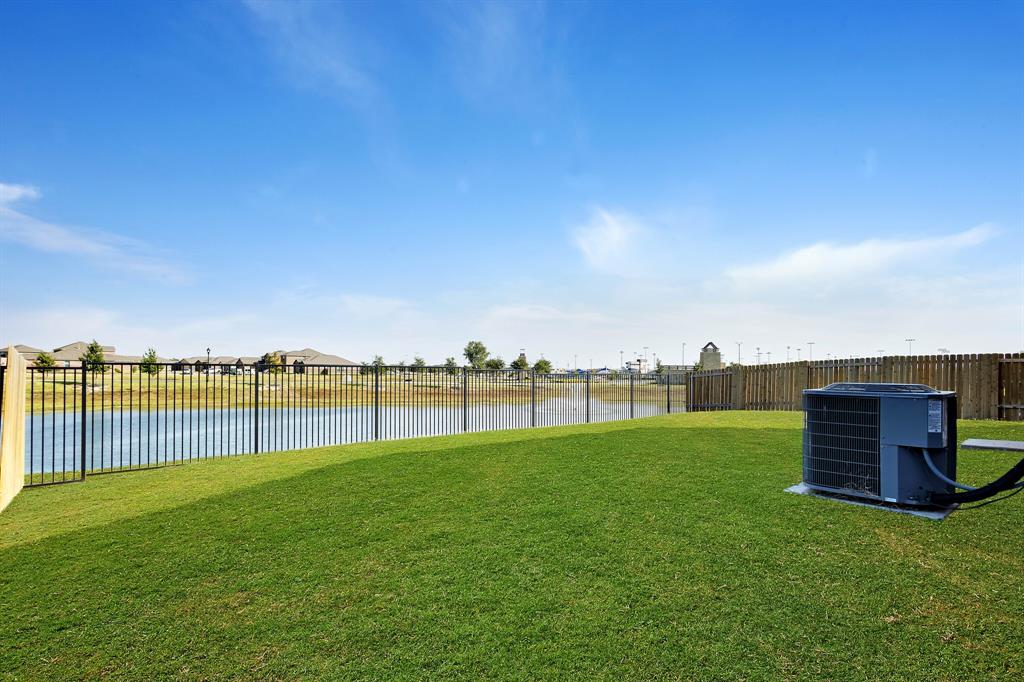 1816 Jeanine Drive Anna, TX 75409 - Photo 2 of 23 a view of a garden and lake