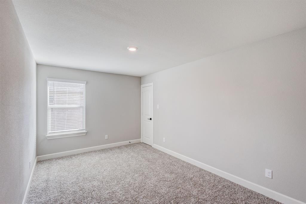 1816 Jeanine Drive Anna, TX 75409 - Photo 21 of 23 an empty room with windows