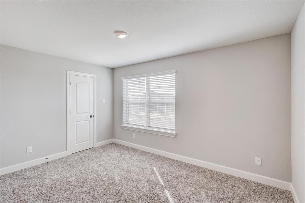 1816 Jeanine Drive Anna, TX 75409 - Photo 22 of 23 a view of an empty room with a window