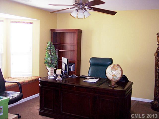 3102 Spring Fancy Lane Indian Trail, NC 28079 - Photo 8 of 11 a living room with furniture and wooden floor