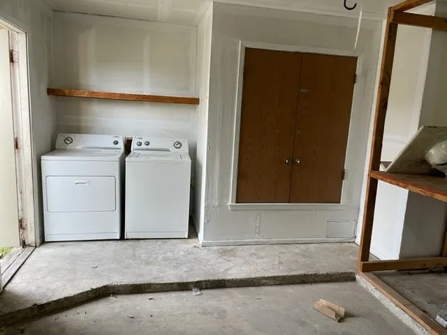 a utility room with a washer and dryer