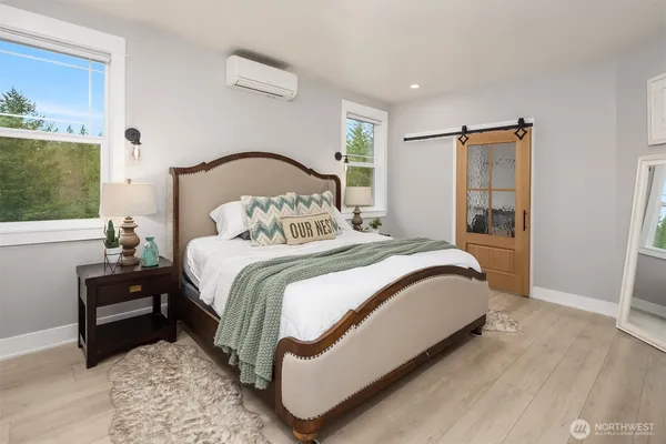 a bathroom with a sink a mirror and a shower