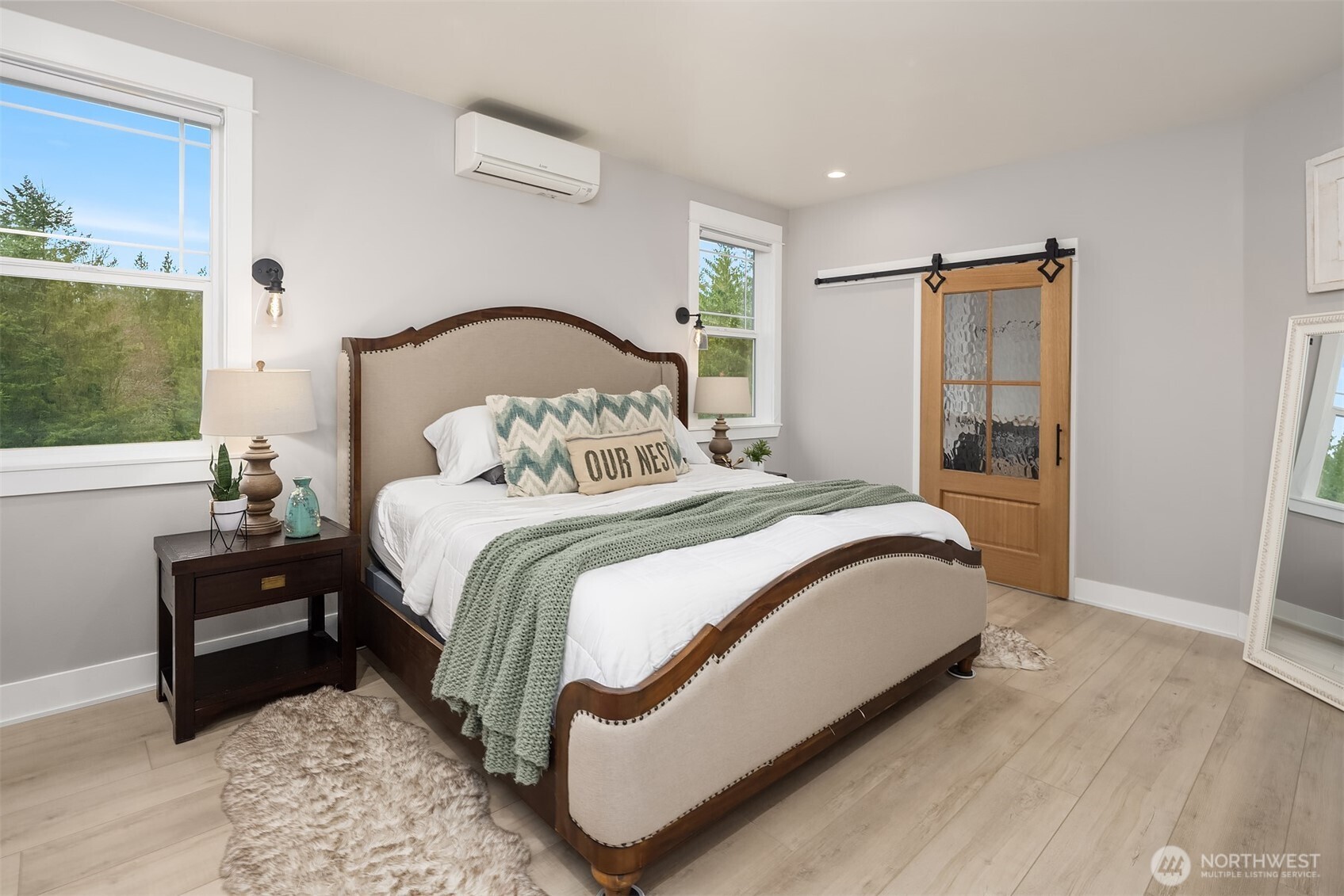 6937 Lake Alice Road Southeast Fall City, WA 98024 - Photo 18 of 39 a bedroom with bed and a window