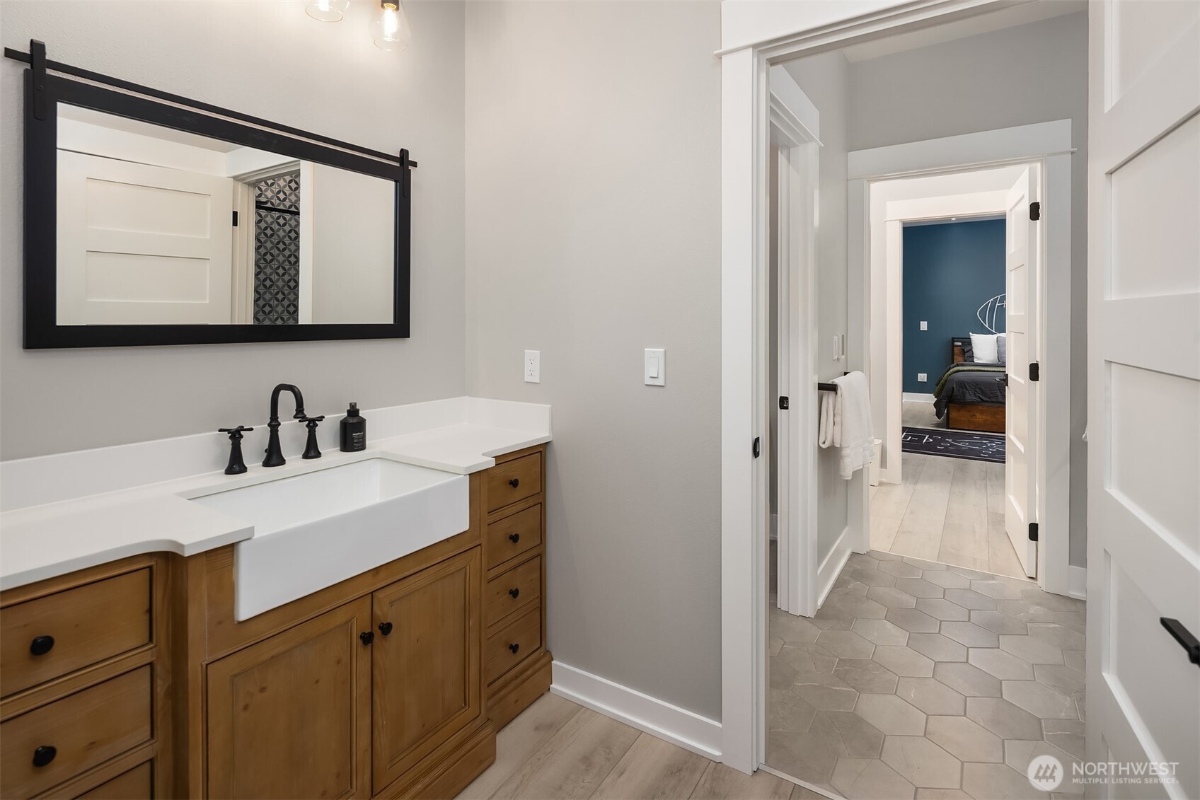6937 Lake Alice Road Southeast Fall City, WA 98024 - Photo 23 of 39 a bathroom with a sink vanity and mirror