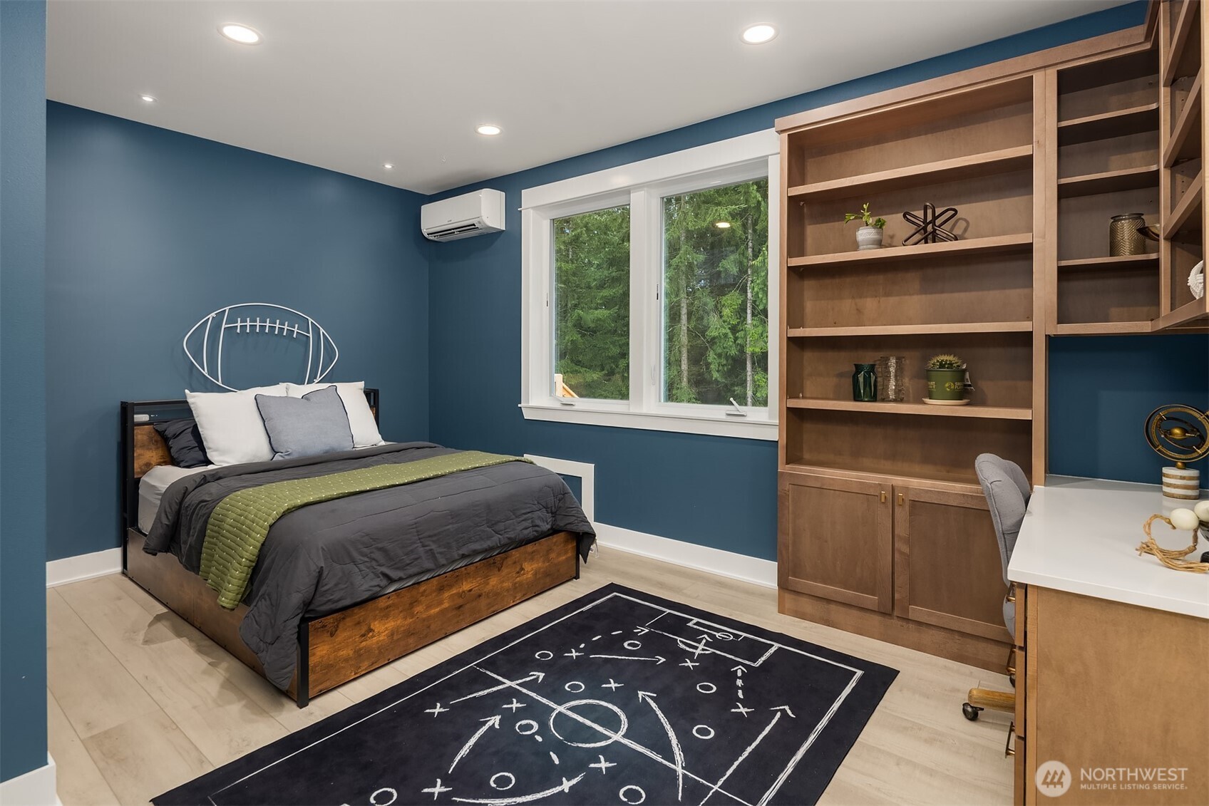 6937 Lake Alice Road Southeast Fall City, WA 98024 - Photo 26 of 39 a bedroom with a bed and a window