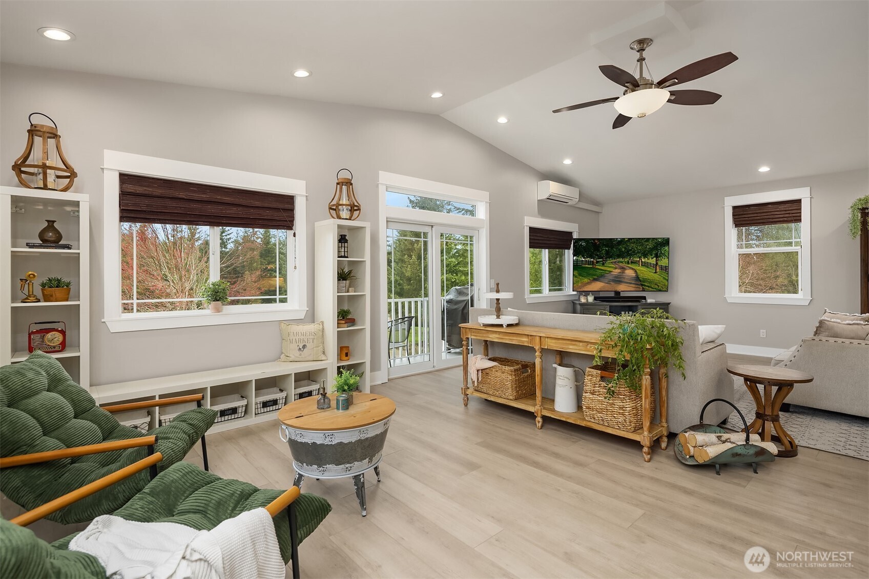 6937 Lake Alice Road Southeast Fall City, WA 98024 - Photo 4 of 39 a living room with furniture and a large window