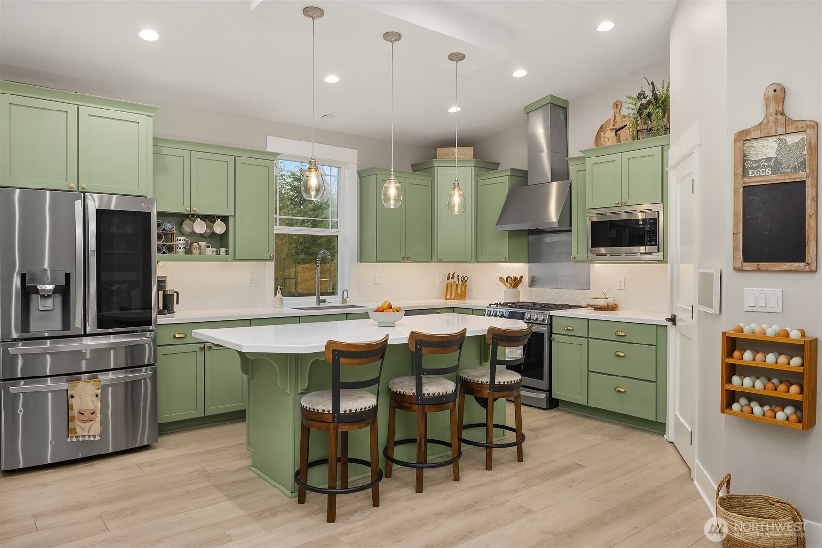 6937 Lake Alice Road Southeast Fall City, WA 98024 - Photo 9 of 39 a kitchen with sink cabinets and wooden floor
