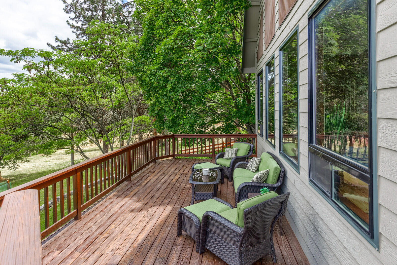 3181 Old Stage Road Central Point, OR 97502 - Photo 57 of 78 a view of balcony with furniture and wooden deck