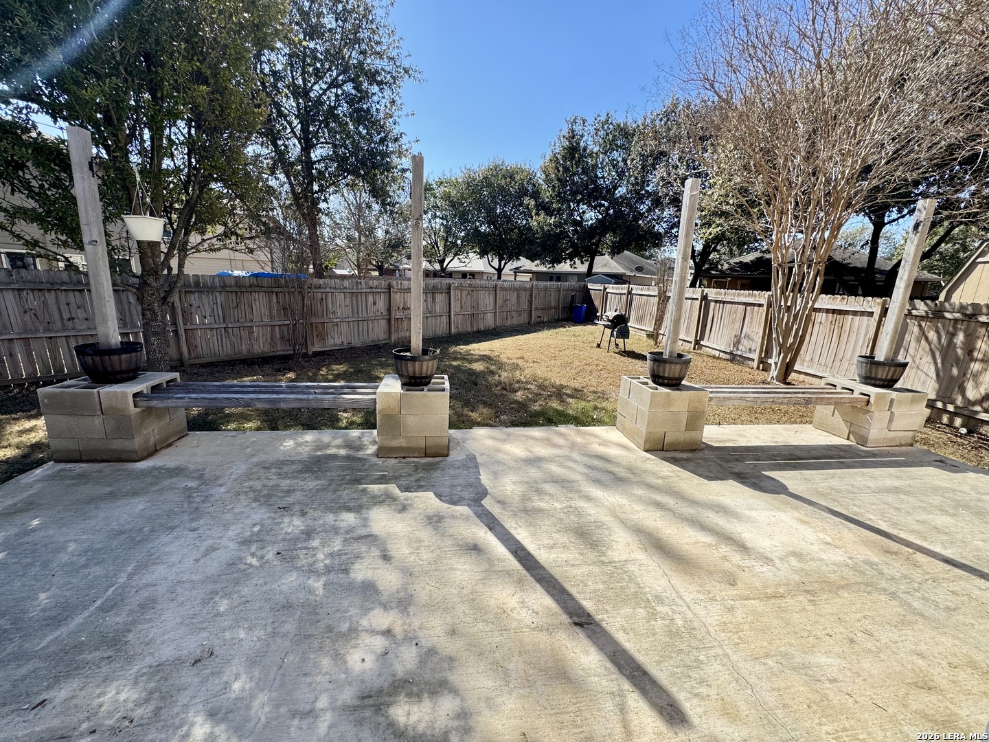 7906 Belmont Ridge Selma, TX 78154 - Photo 15 of 22 a view of a backyard with sitting area