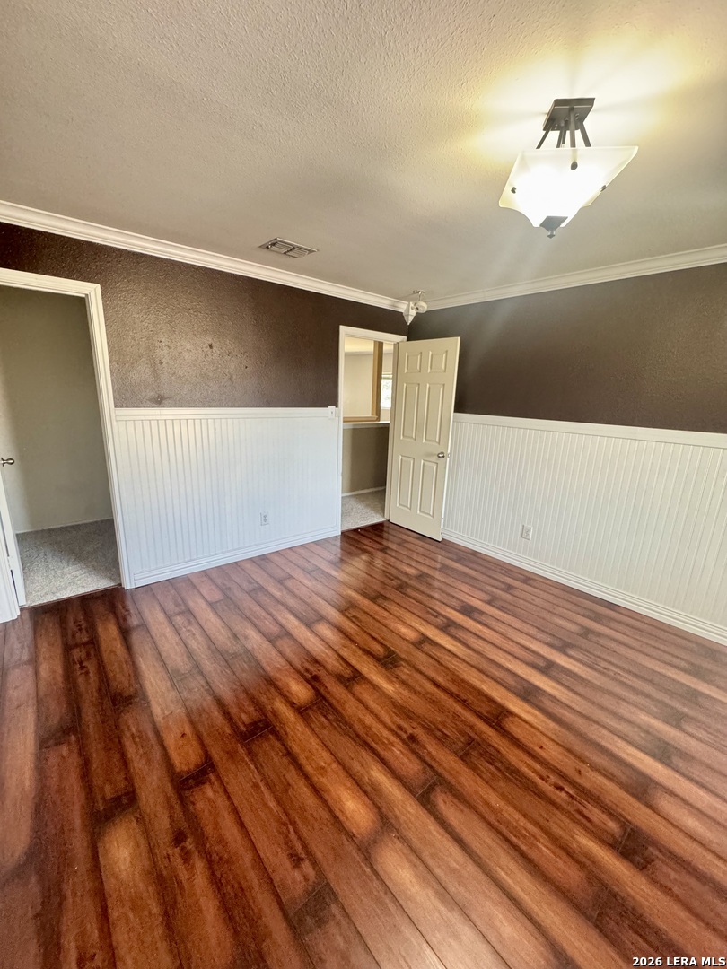 7906 Belmont Ridge Selma, TX 78154 - Photo 18 of 22 a view of empty room with wooden floor