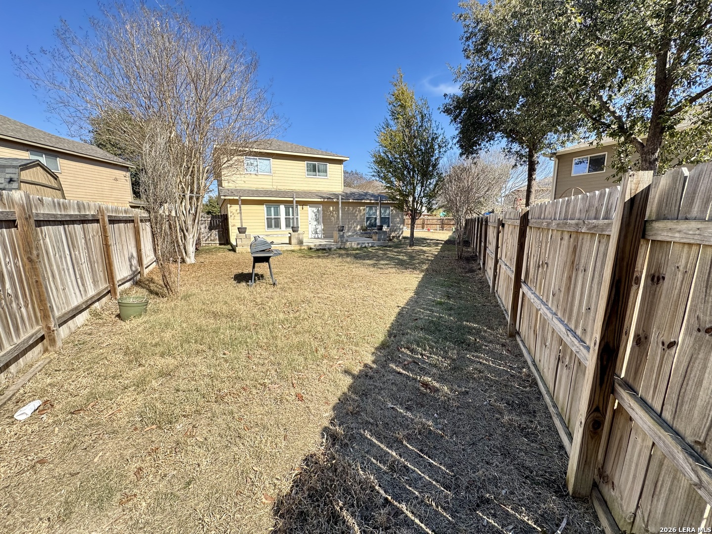 7906 Belmont Ridge Selma, TX 78154 - Photo 19 of 22 a view of a house with backyard and sitting area