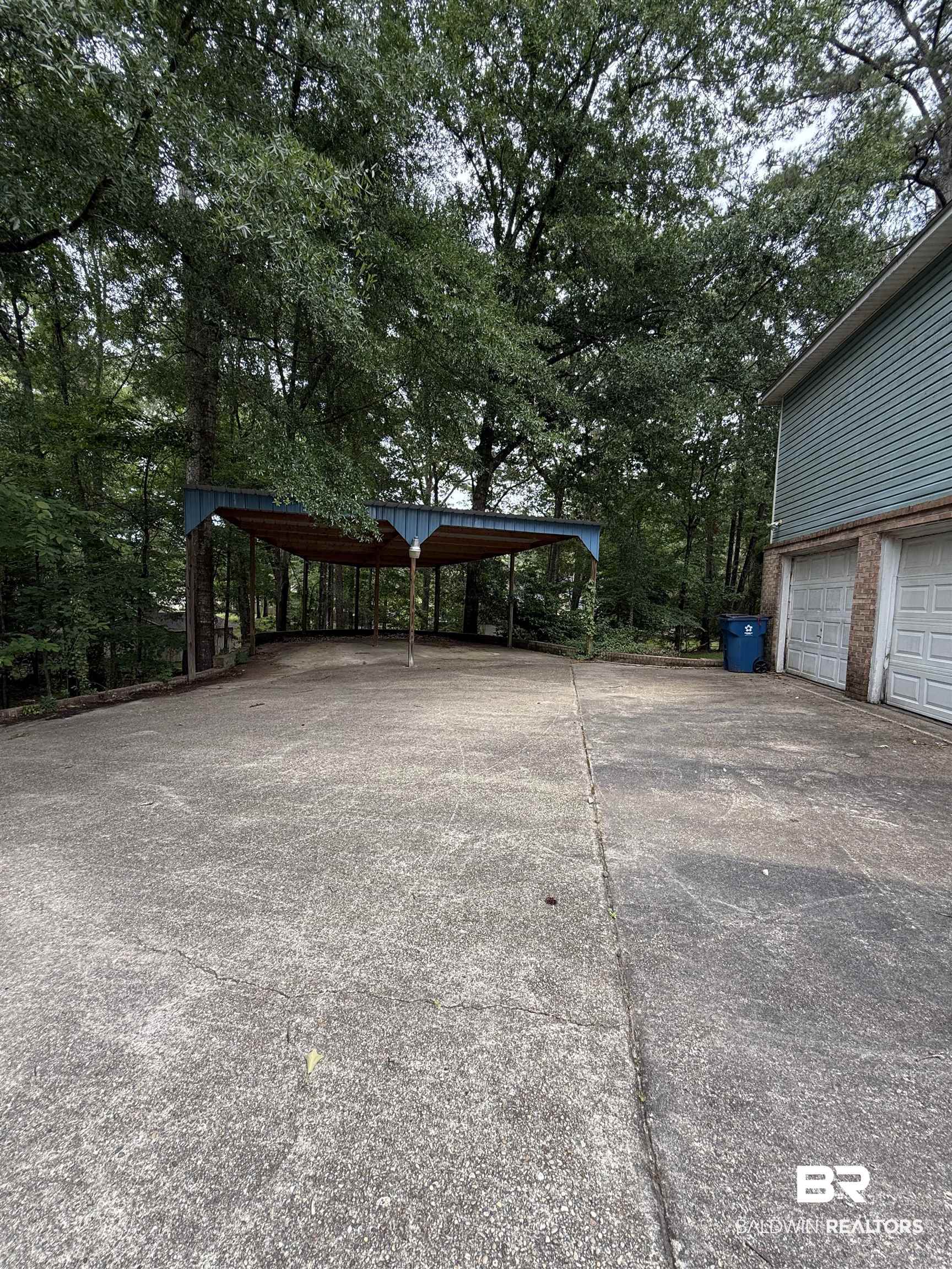 295 Norwood Road Monroeville, AL 36460 - Photo 32 of 32 View of yard with driveway