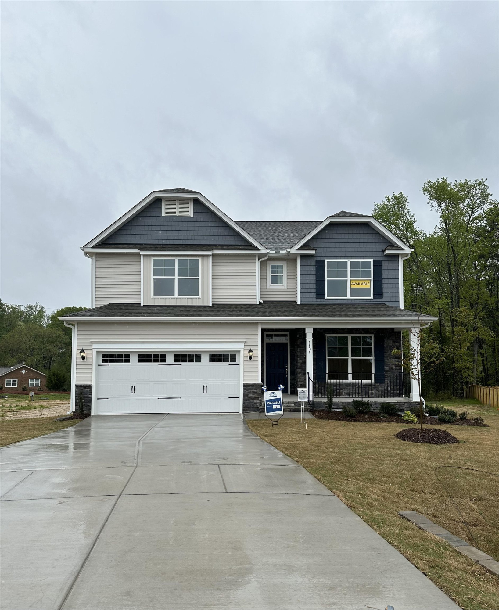 4304 Beckel Road Willow Spring, NC 27592 - Photo 1 of 28 a front view of a house with a yard