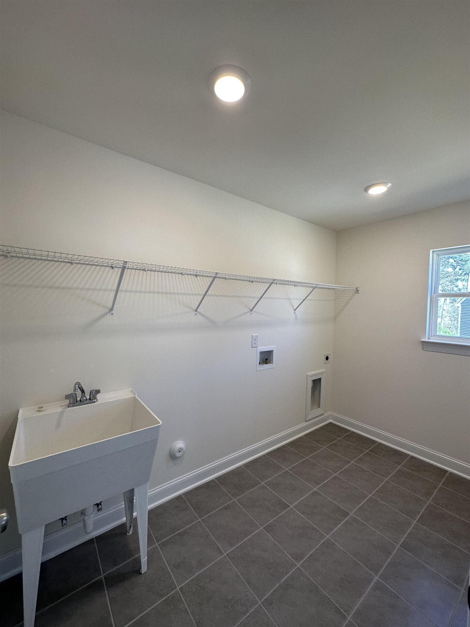 4304 Beckel Road Willow Spring, NC 27592 - Photo 11 of 28 a room with a table and chairs