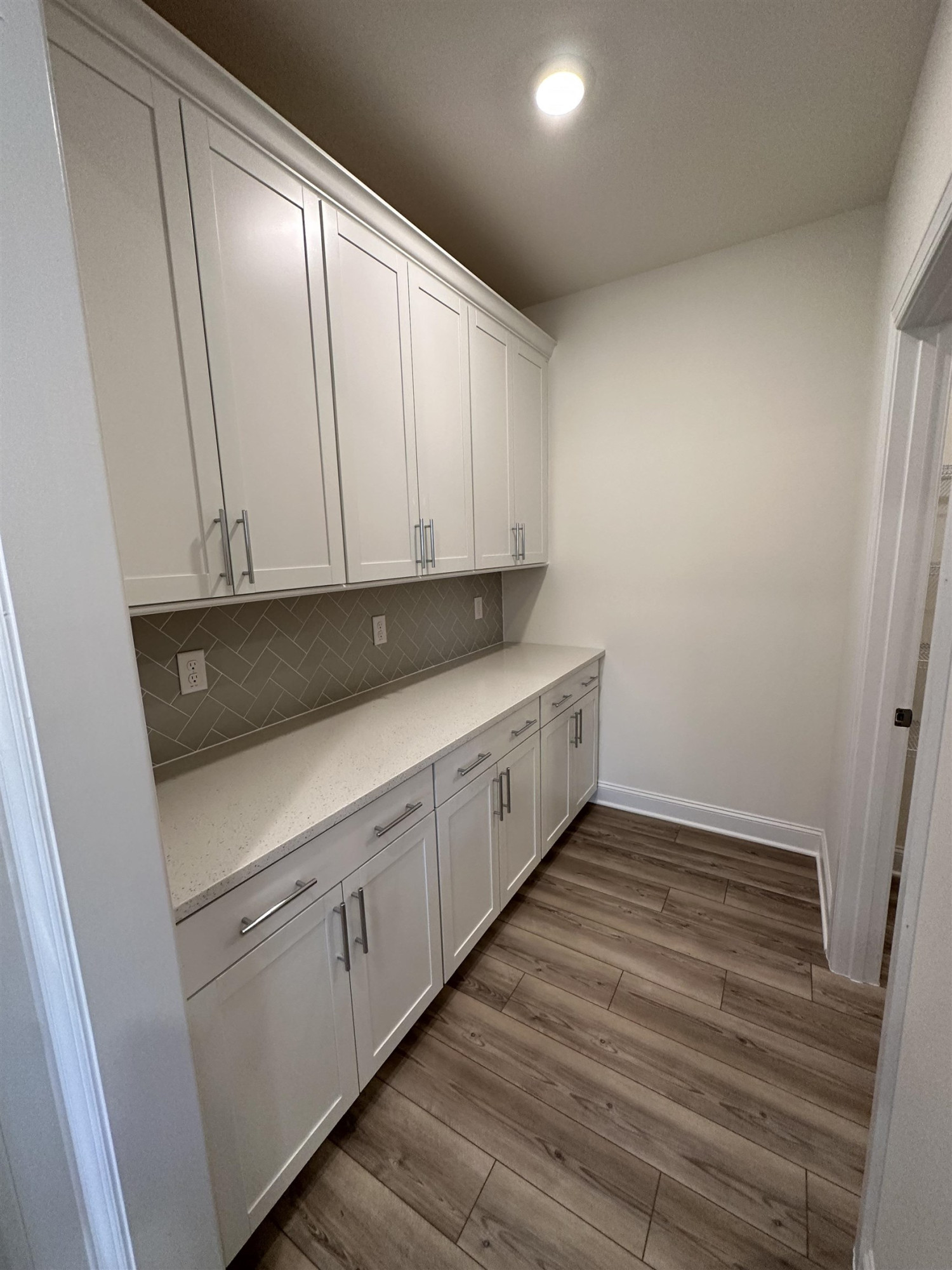 4304 Beckel Road Willow Spring, NC 27592 - Photo 7 of 28 a view of cabinets and wooden floor