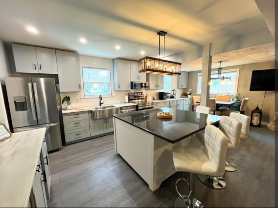 2524 Stinson Road Nashville, TN 37214 - Photo 1 of 23 a kitchen with stainless steel appliances granite countertop a sink a stove and refrigerator