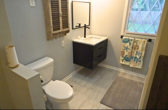 2524 Stinson Road Nashville, TN 37214 - Photo 16 of 23 a bathroom with a toilet sink and mirror