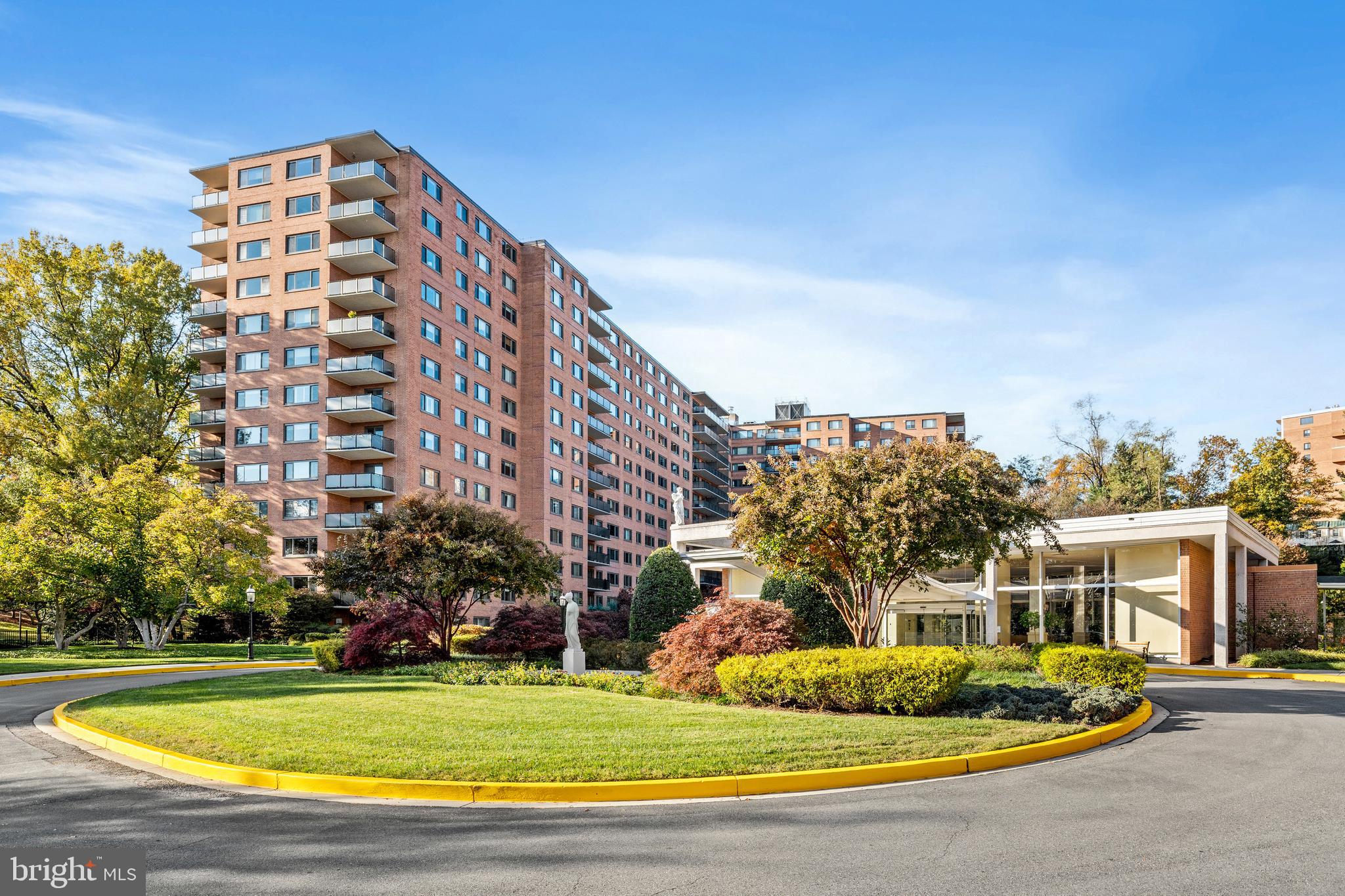 4201 Cathedral Avenue Northwest, Unit 1415W Washington, DC 20016 - Photo 2 of 36 a view of building with yard
