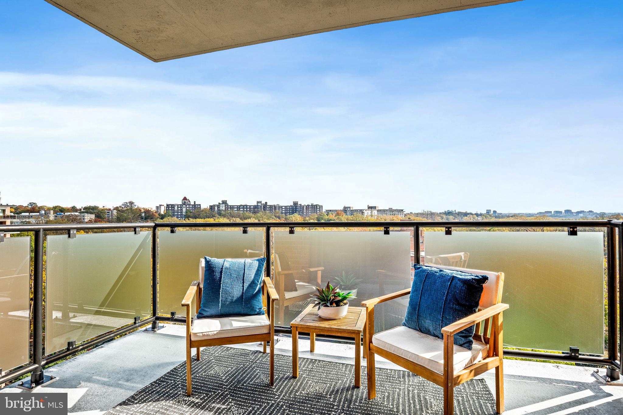 4201 Cathedral Avenue Northwest, Unit 1415W Washington, DC 20016 - Photo 23 of 36 a view of a lake from a terrace