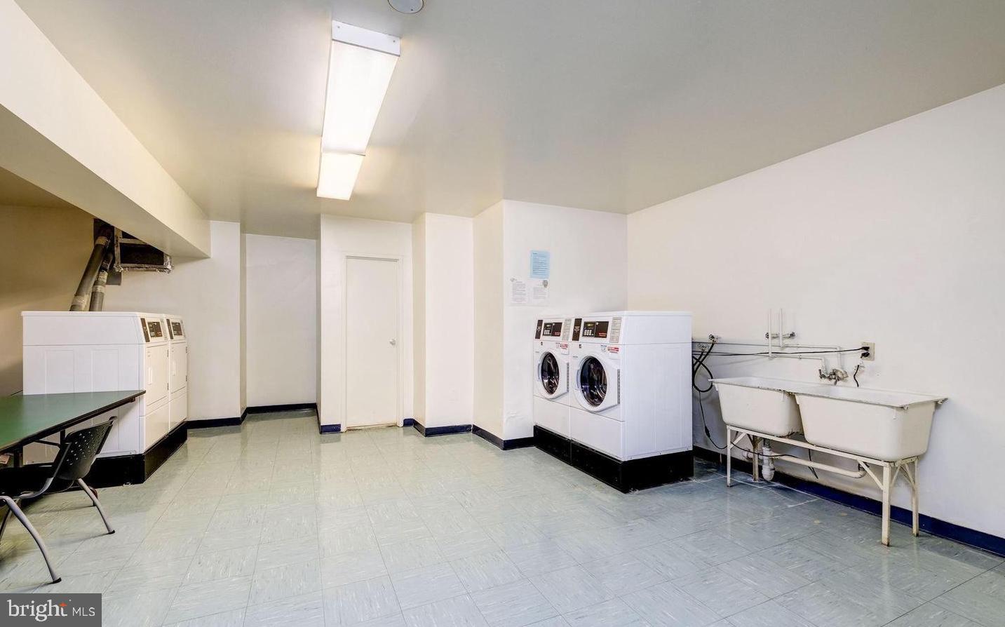 4201 Cathedral Avenue Northwest, Unit 1415W Washington, DC 20016 - Photo 36 of 36 a view of kitchen with furniture and white walls