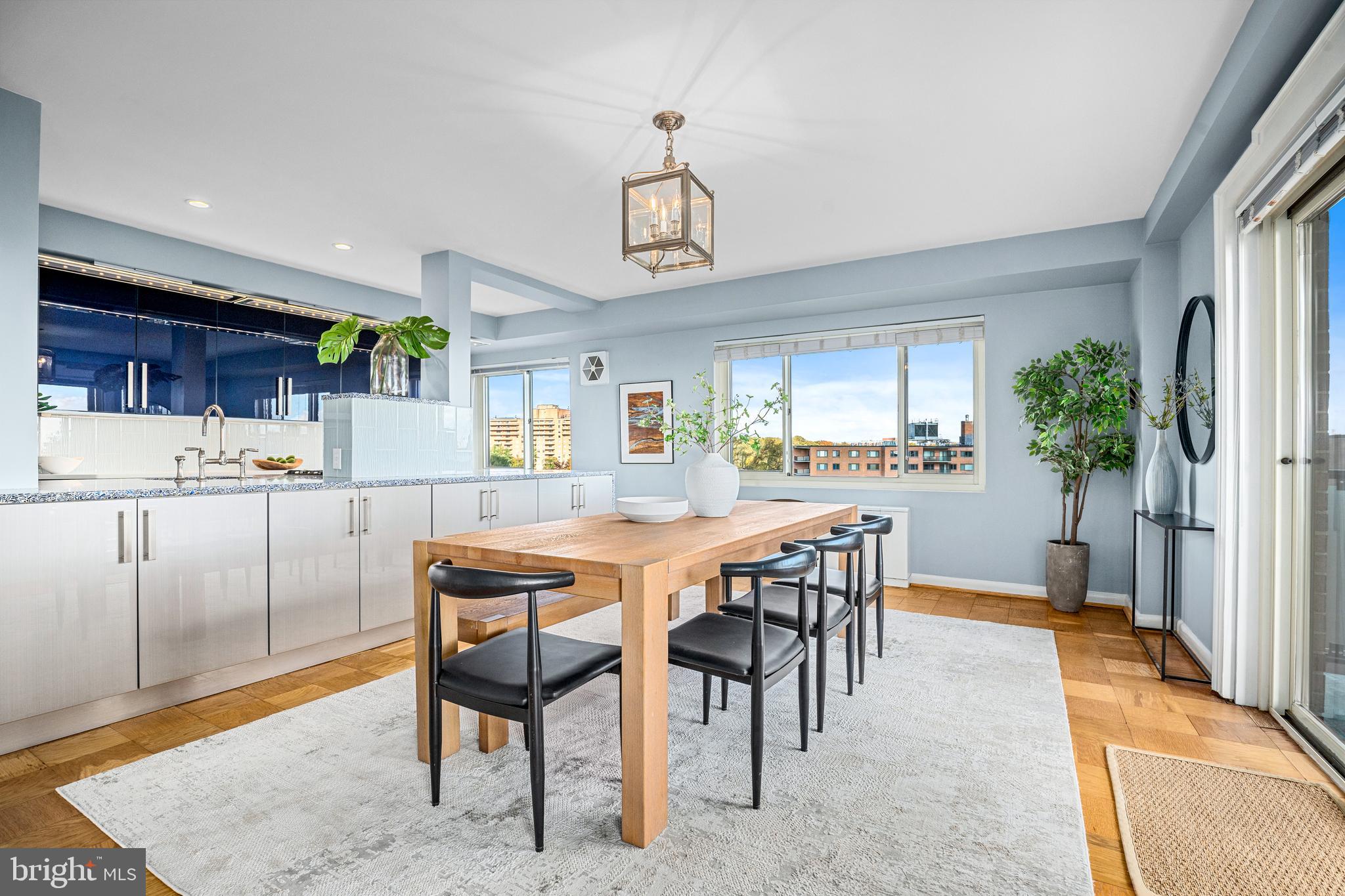 4201 Cathedral Avenue Northwest, Unit 1415W Washington, DC 20016 - Photo 9 of 36 a dining room with furniture and window