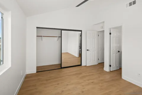a view of a room that has a window in it