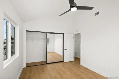 a view of storage and utility room with washer and dryer