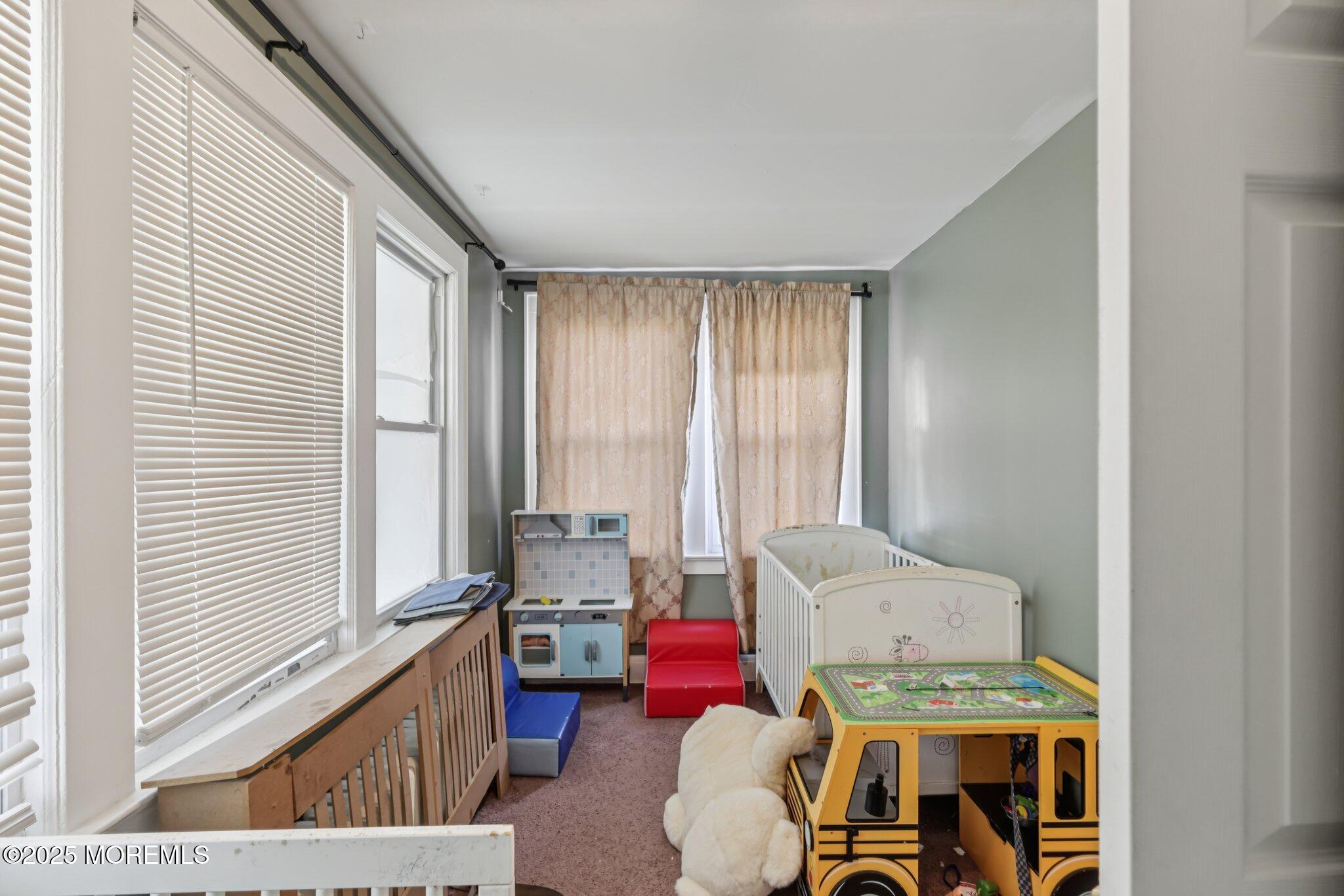 16 Reimer Street Raritan, NJ 08869 - Photo 12 of 30 a living room with furniture and a window