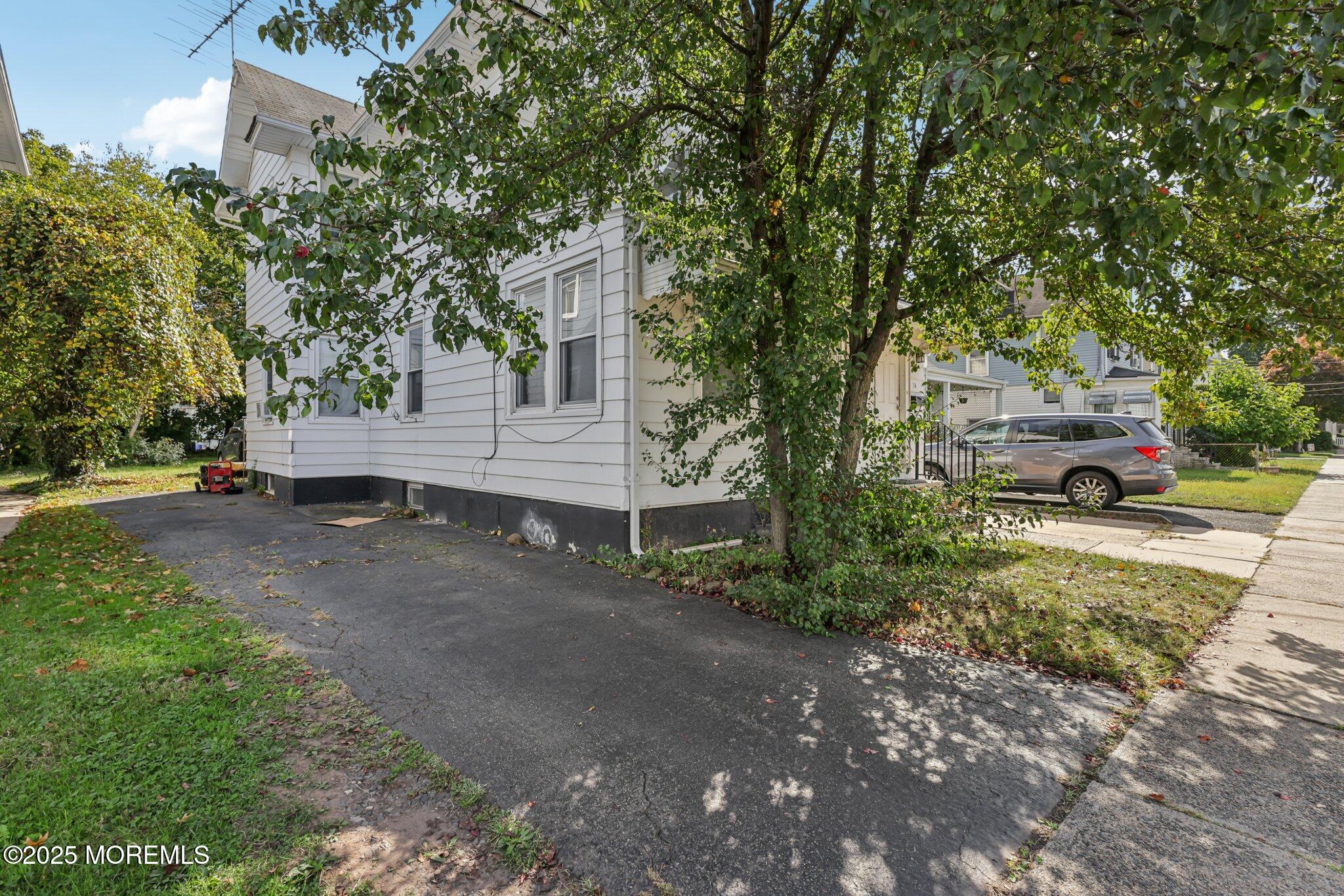 16 Reimer Street Raritan, NJ 08869 - Photo 2 of 30 a view of street with parked cars