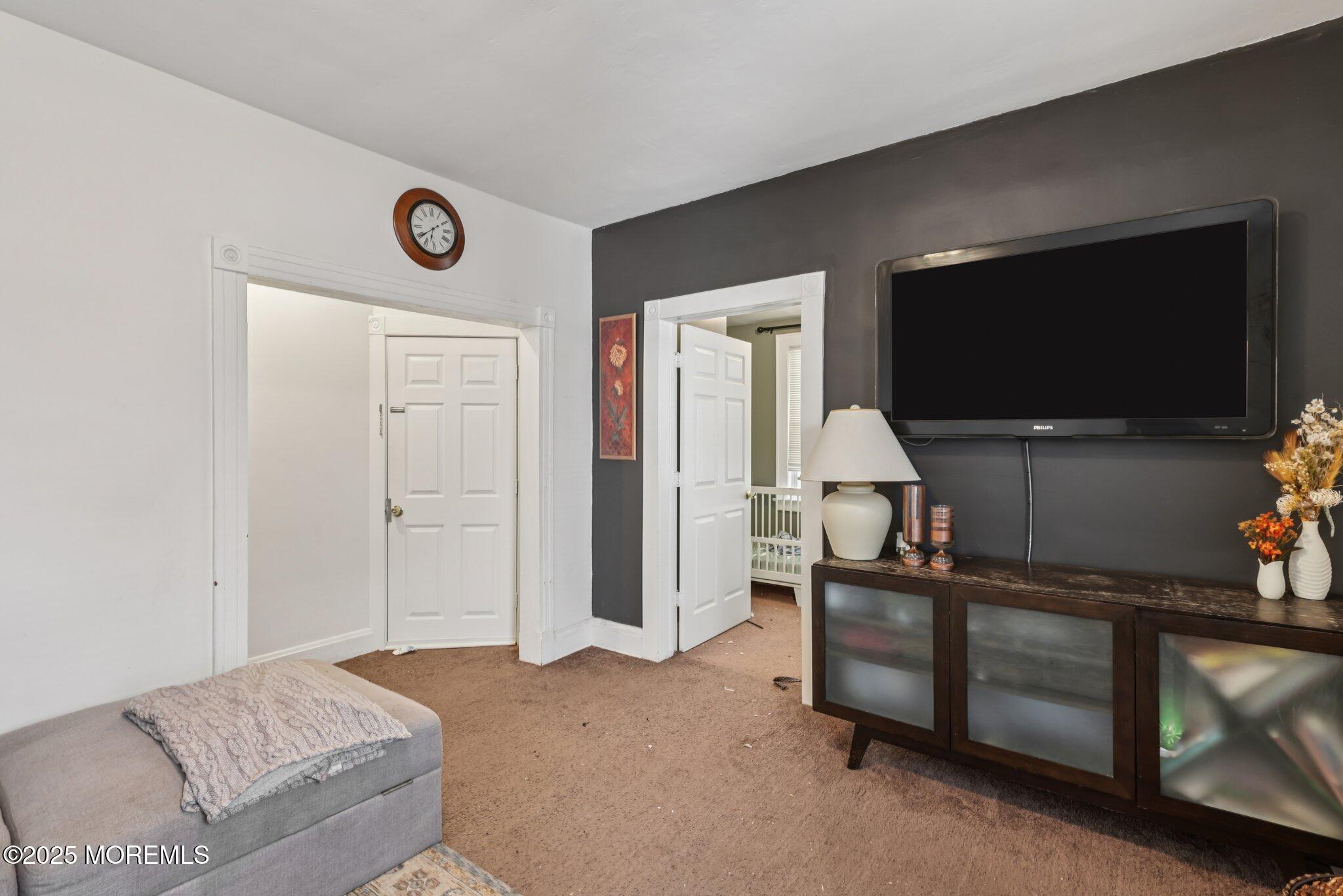 16 Reimer Street Raritan, NJ 08869 - Photo 5 of 30 a living room with furniture and a flat screen tv