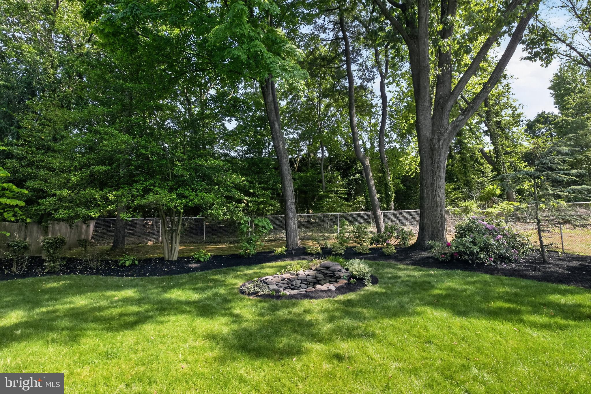 549 Covered Bridge Road Cherry Hill, NJ 08034 - Photo 8 of 16 a view of a backyard with a garden