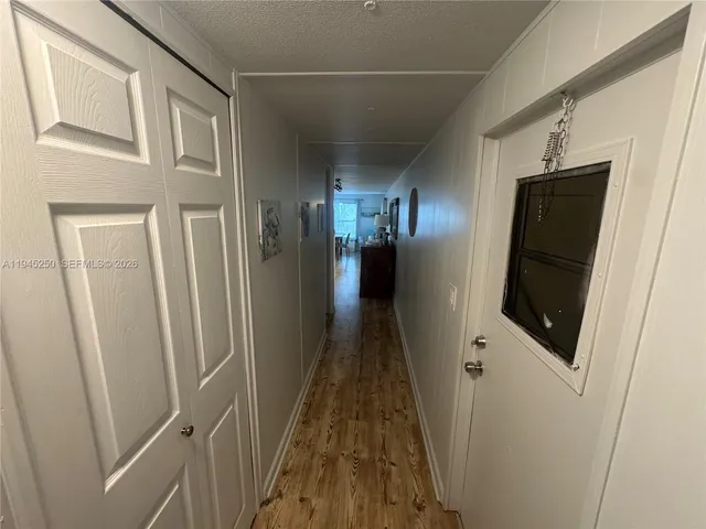 a view of hallway with stairs