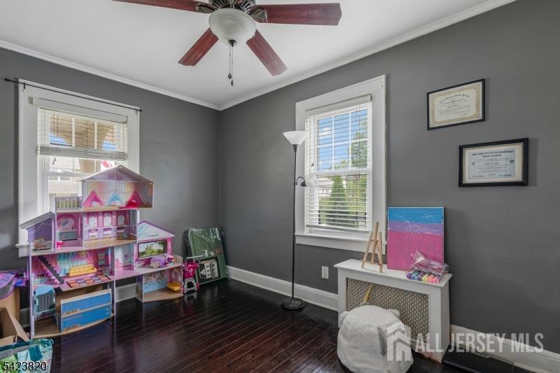 110 Parker Street Middlesex, NJ 08846 - Photo 14 of 25 a bedroom with furniture and a window