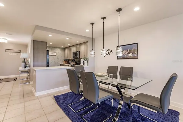 a view of a dining room with furniture