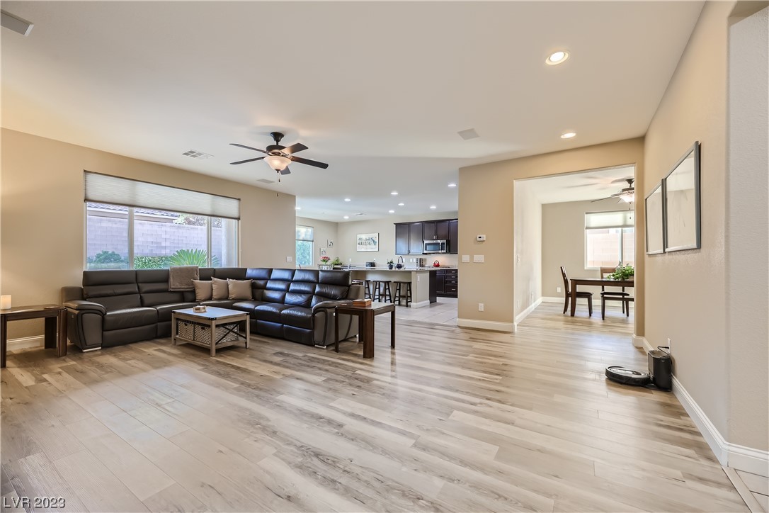 7421 Manse Ranch Avenue Las Vegas, NV 89179 - Photo 15 of 50 The great room has surround sound speakers.