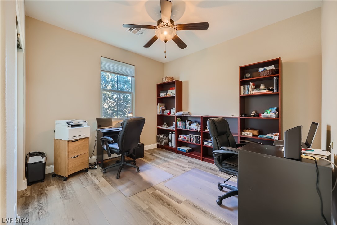 7421 Manse Ranch Avenue Las Vegas, NV 89179 - Photo 29 of 50 One of the bedrooms is being used as an office.