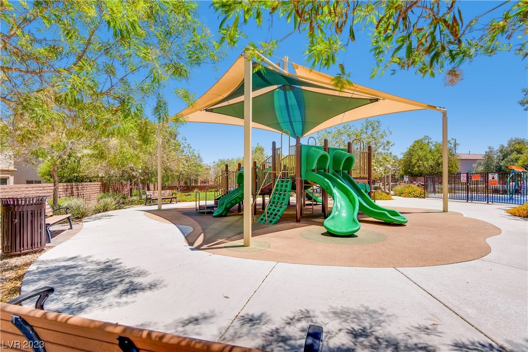7421 Manse Ranch Avenue Las Vegas, NV 89179 - Photo 45 of 50 Shaded tot lot and the nearby splash pad found at