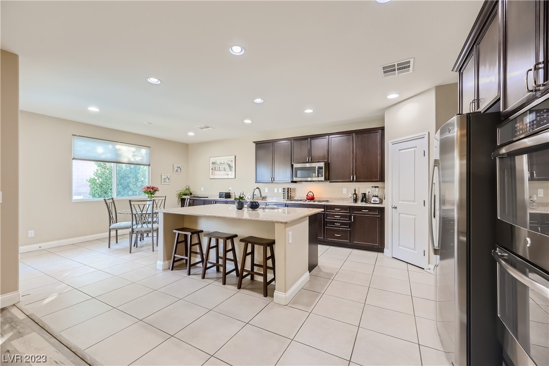 7421 Manse Ranch Avenue Las Vegas, NV 89179 - Photo 5 of 50 The kitchen has a reverse osmosis system that deli