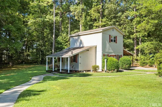 front view of a house with a yard