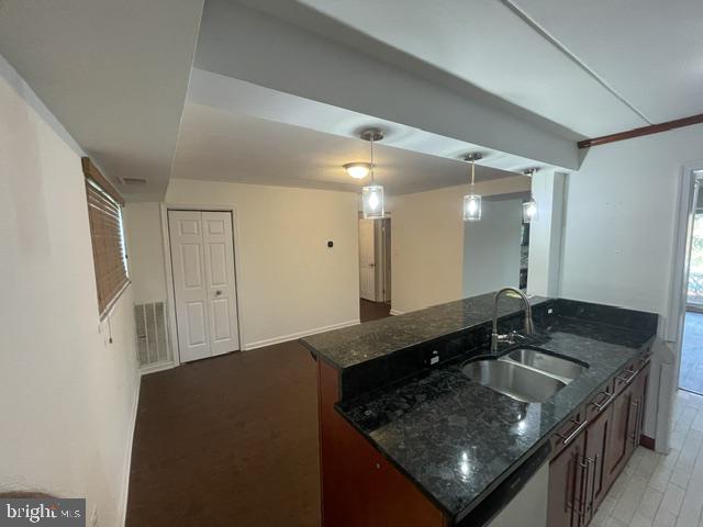 3346 Hewitt Avenue, Unit 11A Silver Spring, MD 20906 - Photo 14 of 16 a kitchen with granite countertop a sink and a granite top