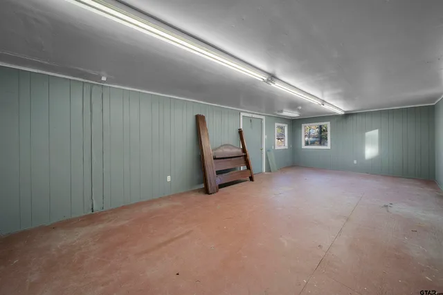 a view of a yard with trees