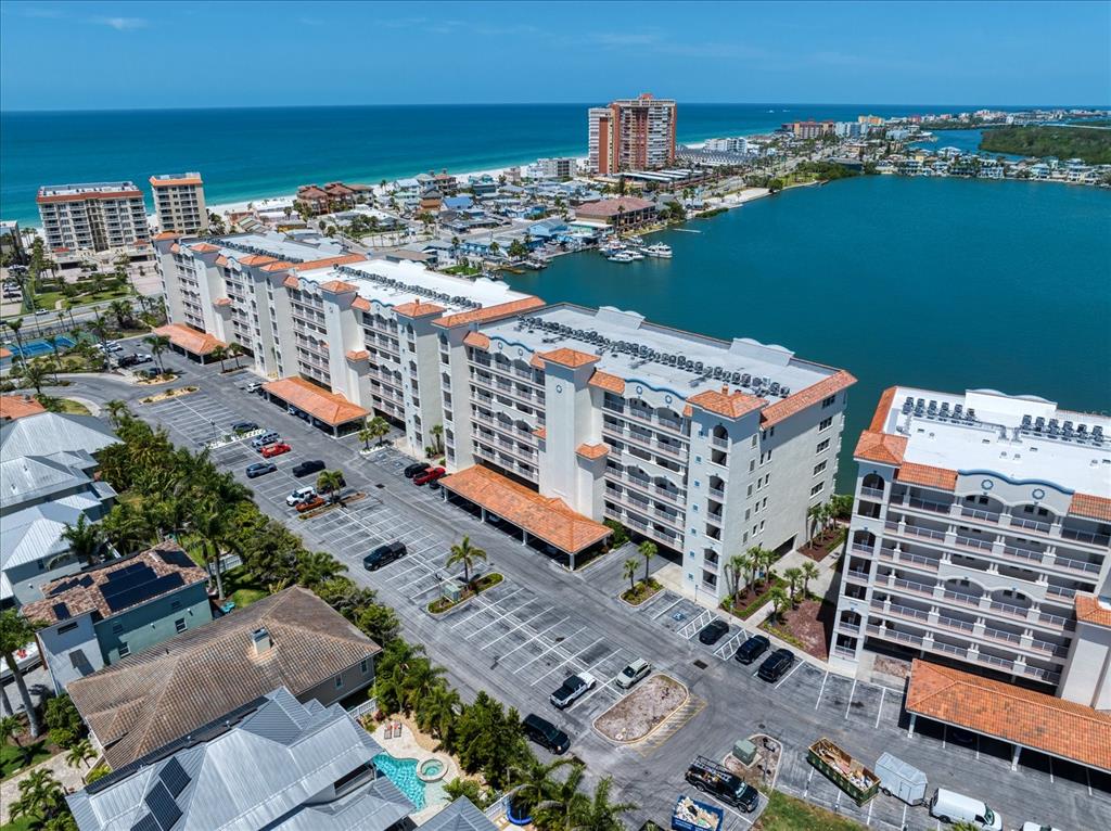 17735 Gulf Boulevard, Unit 304 Redington Shores, FL 33708 - Photo 1 of 66 a city view with tall buildings