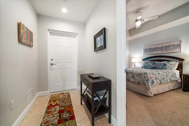 a kitchen with stainless steel appliances granite countertop wooden cabinets a stove a sink and a refrigerator