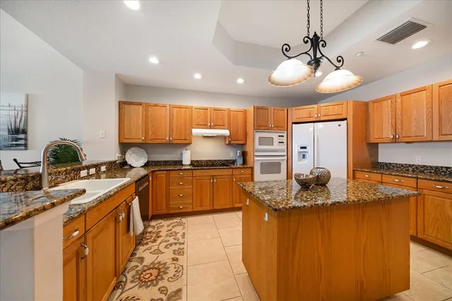 a balcony with furniture and city view