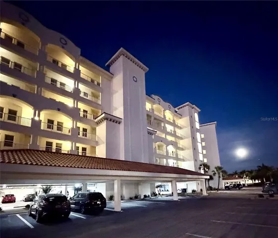 an aerial view of a city with ocean view