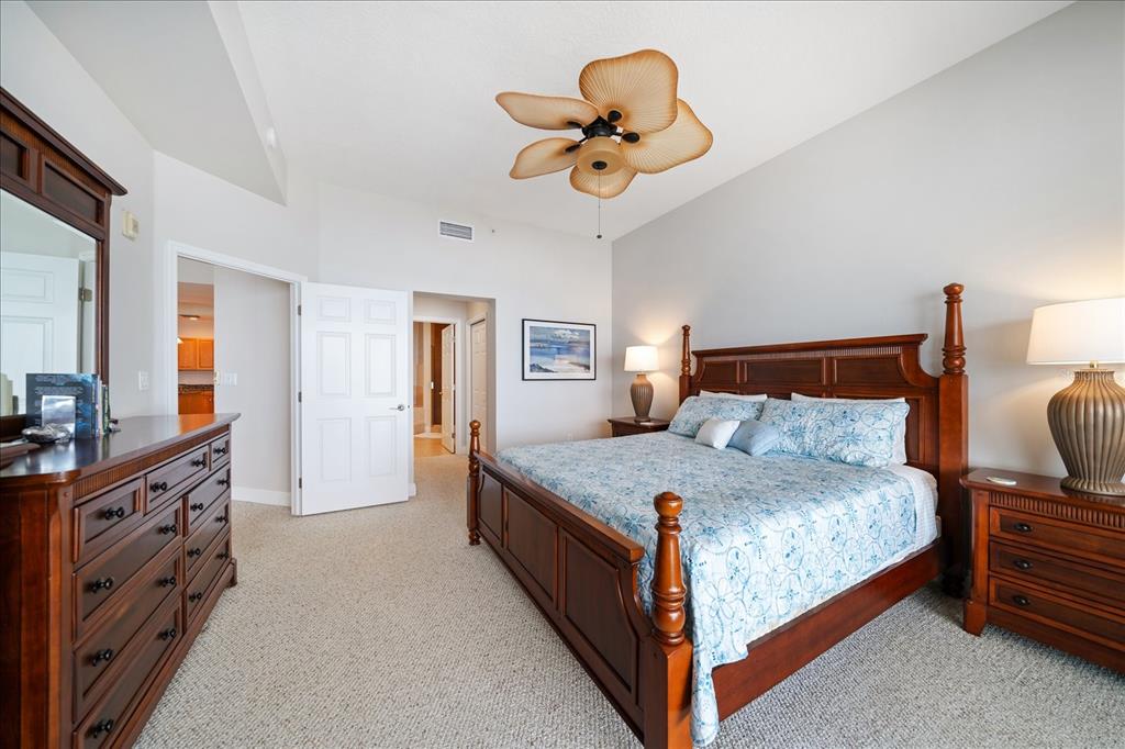 17735 Gulf Boulevard, Unit 304 Redington Shores, FL 33708 - Photo 31 of 66 a bedroom with a bed and dresser