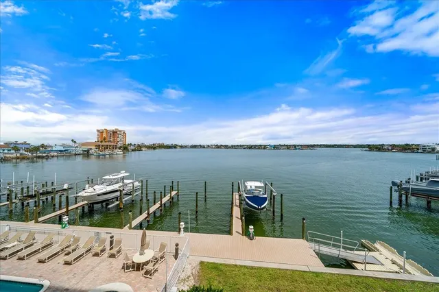a view of a balcony with chairs