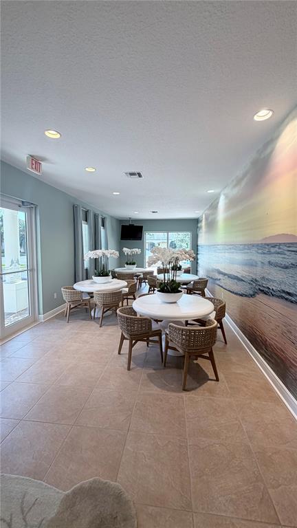 17735 Gulf Boulevard, Unit 304 Redington Shores, FL 33708 - Photo 48 of 66 a living room with furniture and a rug