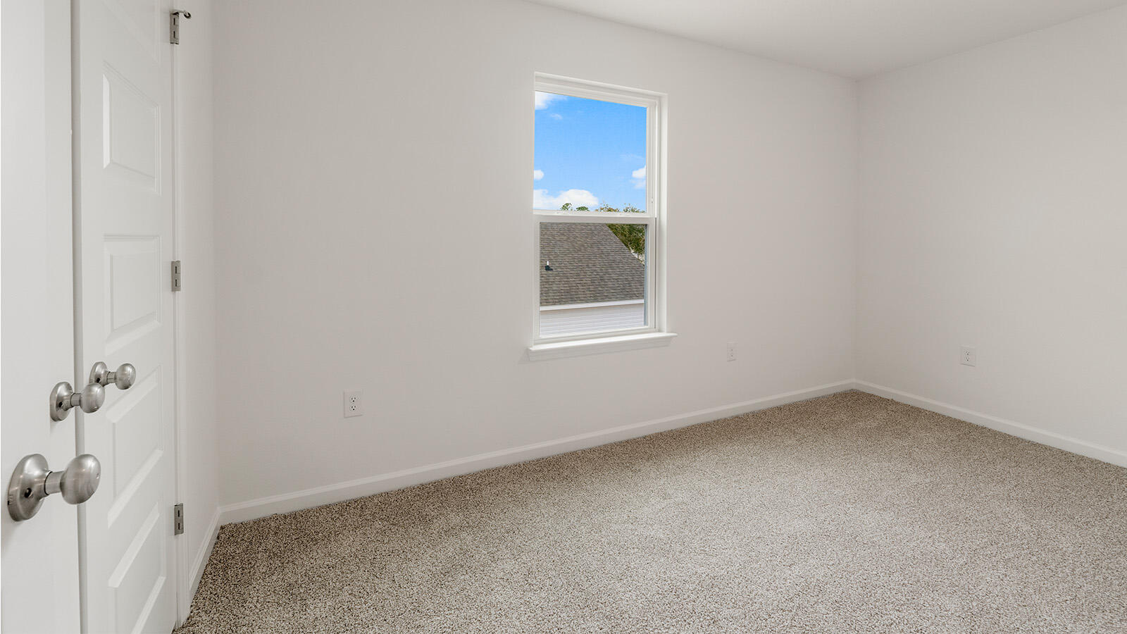 52 Elderberry Street Freeport, FL 32439 - Photo 15 of 36 an empty room with a window