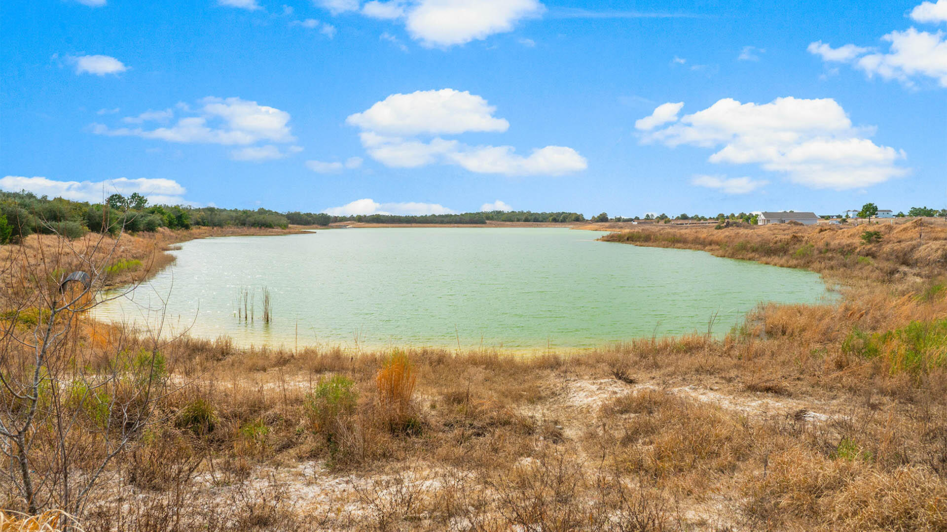 52 Elderberry Street Freeport, FL 32439 - Photo 34 of 36 a view of a lake from a yard